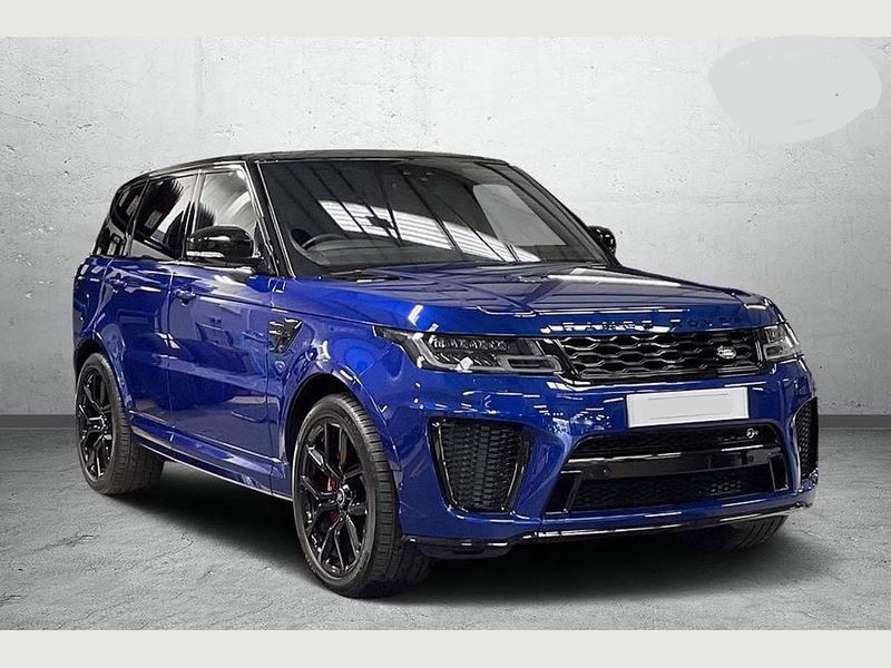 A blue Range Rover SVR parked on a city street.